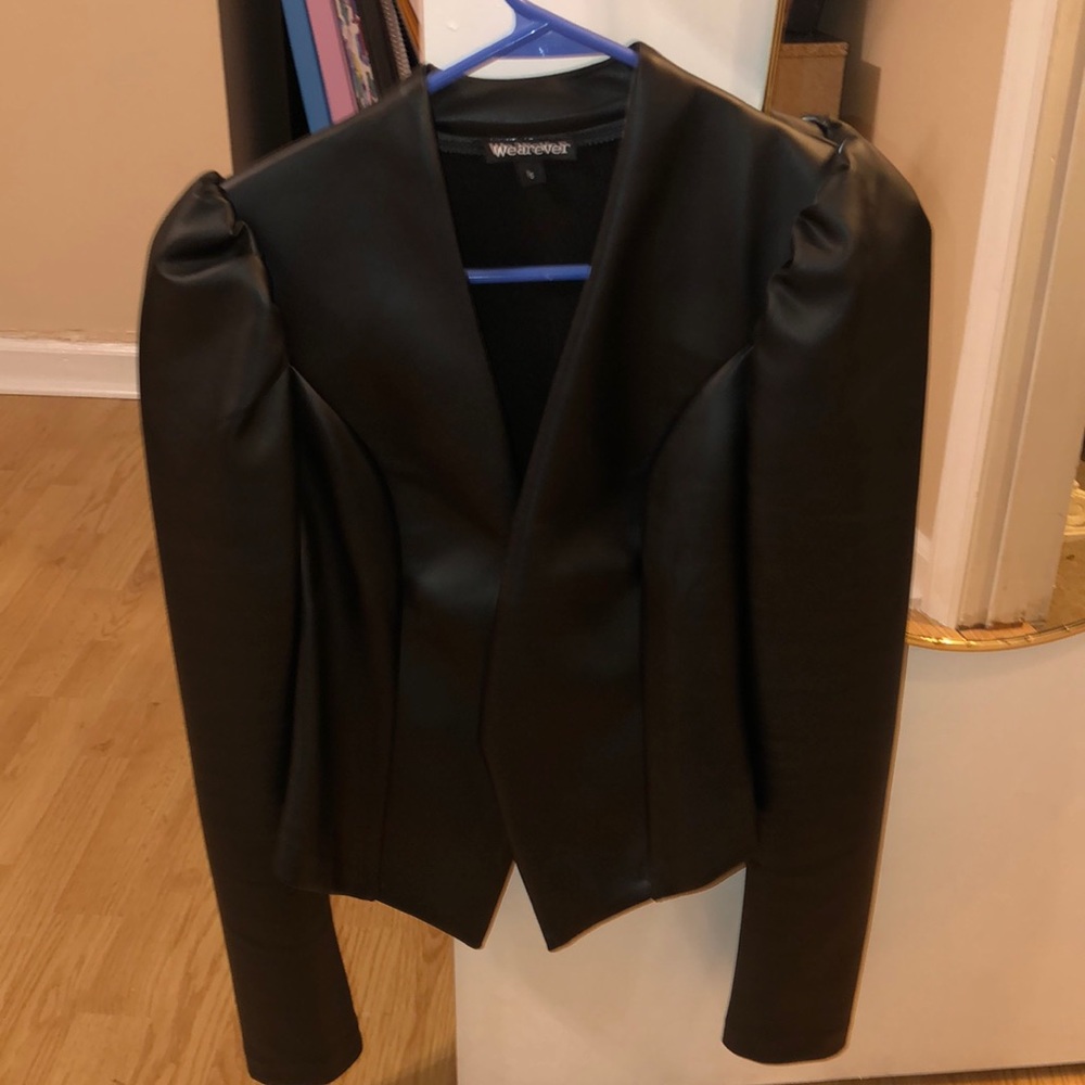 Very flattering leather feel jacket